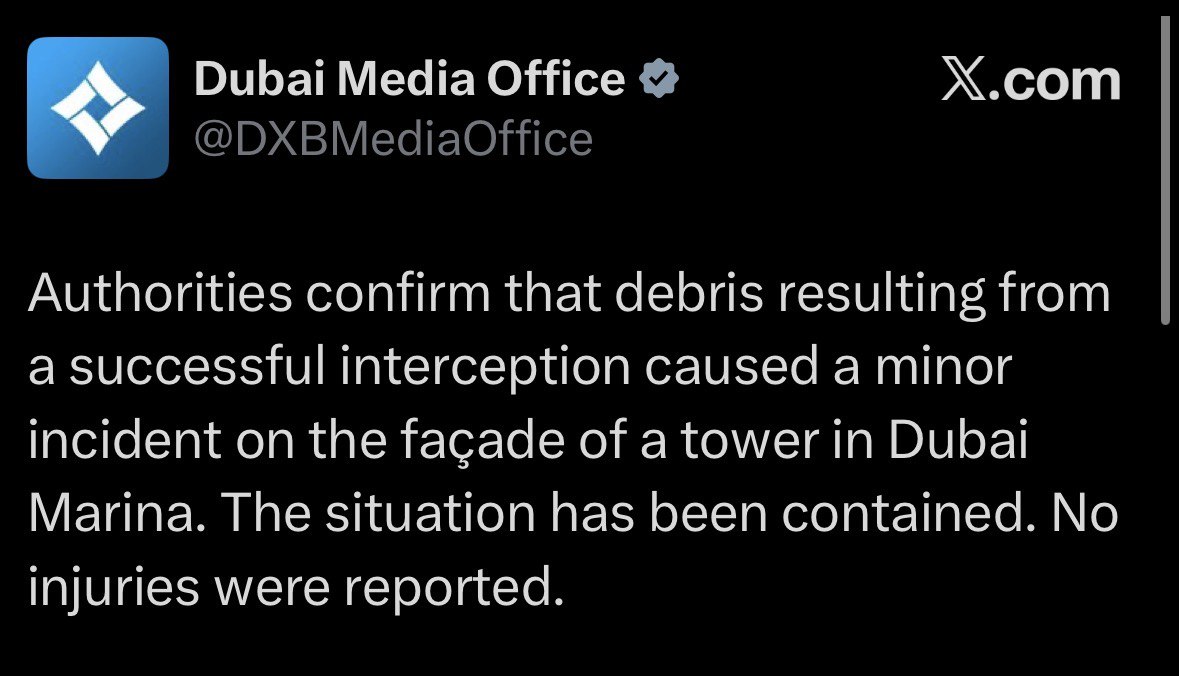 Un turn din zona Dubai Marina, plin de fum azi seara. Autoritățile din Dubai spun că e rezultatul unei interceptări reușite (dronă) și nimeni nu a avut de suferit